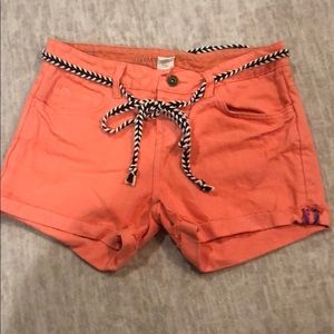 Orange pinkish colored women’s shorts